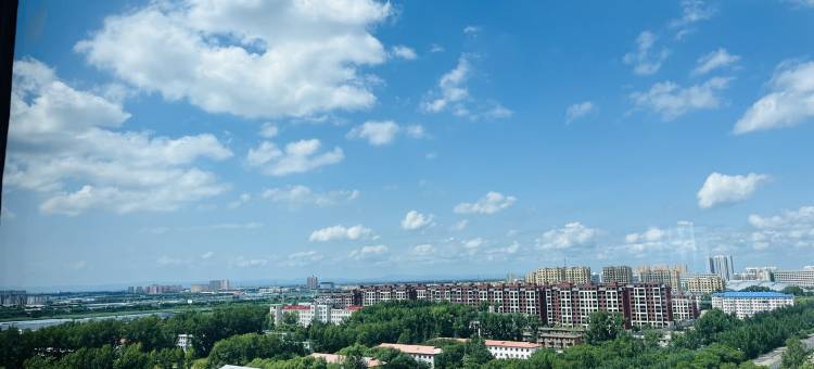 万兴公寓万达附近空调大床房技师学院(万达路分店)图片