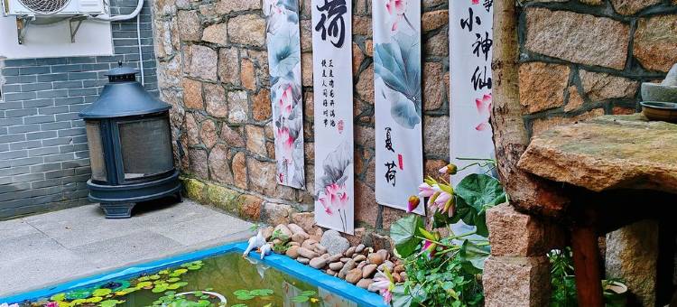 云上居海草房特色民宿(福寿路分店)图片