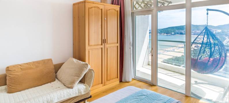 国际海水浴场君威海景民宿(环海路3号分店)图片