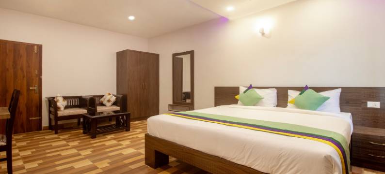 Treebo 精英广场, 距马迪凯里堡700米(Treebo Elite Plaza, 700 Mtrs from Madikeri Fort)图片