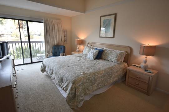 Serene Lake Views and Community Pool - Charming Coastal Retreat