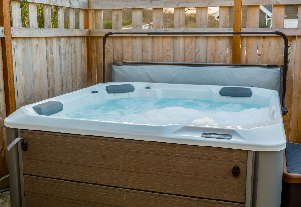 Open Concept Living and Back Porch Bliss - Charming Coastal Retreat Hotel Overview