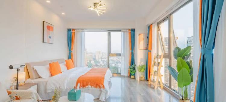 栖牛XINIU·投影自助公寓(乐山万达广场店)图片