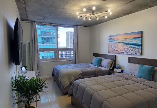 Amazing Condo with Pool at Midblock Miami Hotel Overview