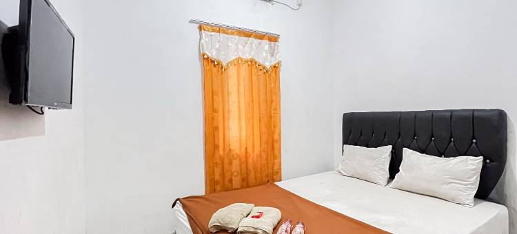 OYO 92626 Dcos Syariah的好眠4旅馆(Good Sleep 4 RedPartner)图片