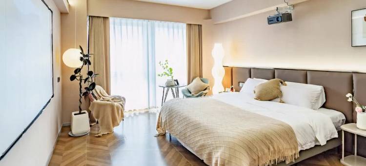 七里拾光·设计师私汤民宿(市中心苏宁广场店)图片