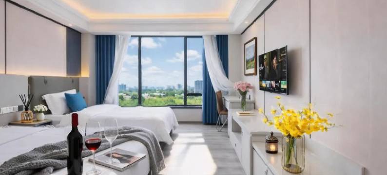 万华逸居酒店(于都站店)图片