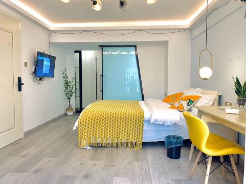 明威吧民宿(梦龙路分店)