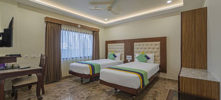 Treebo 阿拉维公寓，距离长廊海滩800米(Treebo Aaravi Residency, 800 Mtrs from Promenade Beach)图片