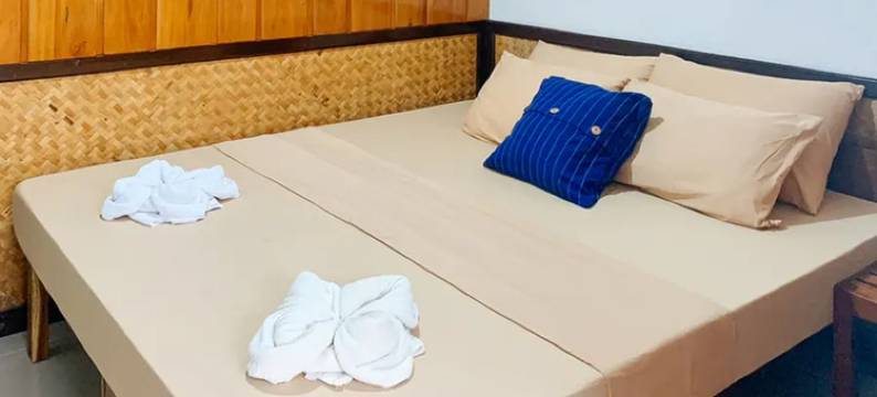 坦迪坎海滩小屋(RedDoorz @ Tandikan Beach Cottages)图片