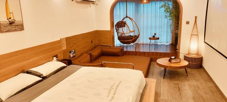 流浪家小桂落地窗海景影院民宿(衙前路分店)图片