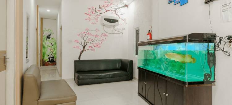 瑞德多兹酒店 - 近巨港贸易中心(RedDoorz at Tara Homestay Palembang)图片
