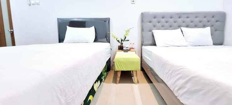 卡里斯玛努山塔拉萨甘米特拉红门酒店(Kharisma Nusantara Homestay Sagan Mitra RedDoorz)图片