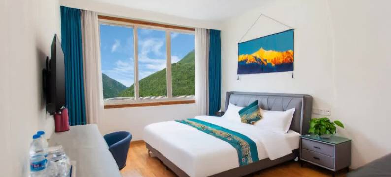 幺妹民宿(康定情歌广场溜溜城店)图片