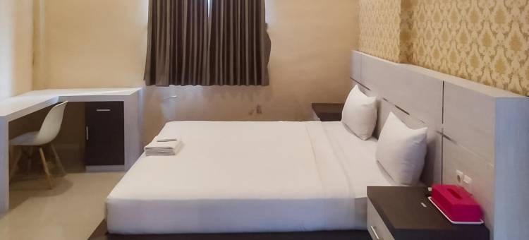 OYO1539阿姆里客房酒店(RedDoorz Syariah Near Sultan Syarif Kasim II Airport)图片