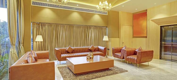 Treebo 高级金色幸福特里穆尔蒂广场(Treebo Premium Golden Bliss Trimurti Nagar Square)图片