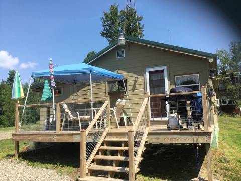 Paddle, float, fish, or rope swing into the near by crystal clear mountain lake.