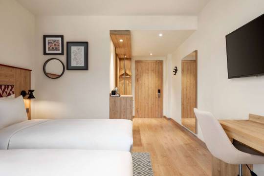 左明温德姆华美达安可酒店(Ramada Encore by Wyndham Zomin)