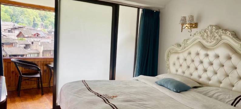 丽江古城与山而栖qi)精品南门民宿(东正街分店)图片