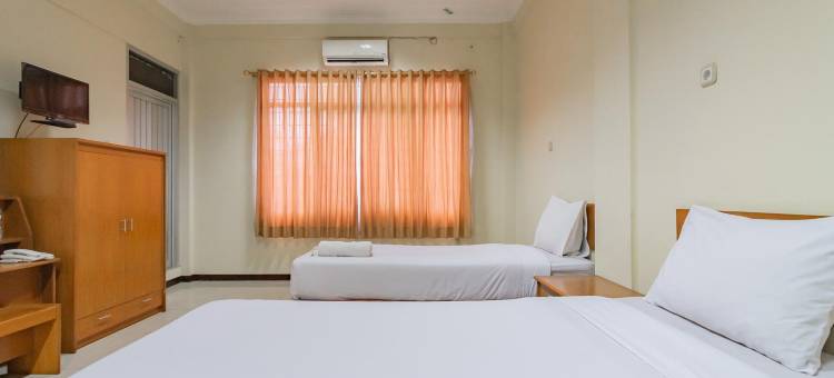 格兰德肯巴尔酒店米特拉红门酒店(Grand Kembar Hotel Mitra RedDoorz)图片