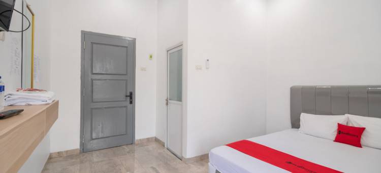 红多兹酒店-近楠榜白沙瓦兰图古科克拉特(RedDoorz Near Tugu Coklat Pesawaran Lampung)图片