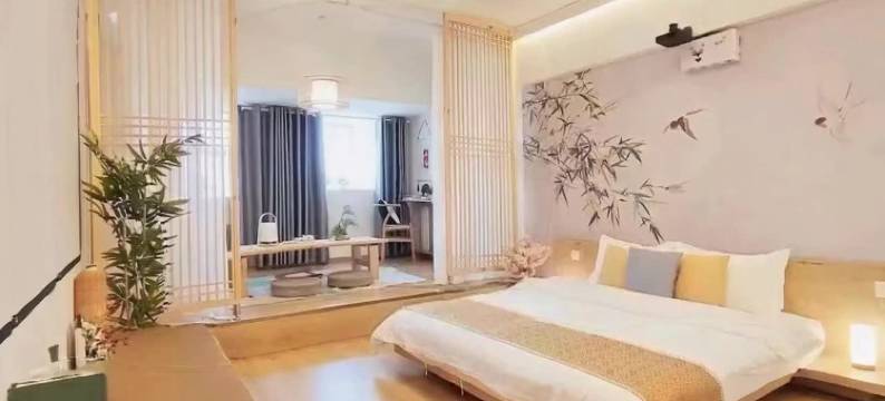 悦庭·楠舍观影民宿(天明财富广场文理学院店)图片