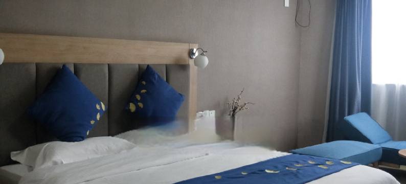 中州商务酒店(洛阳牡丹公园上海市场地铁站店)图片