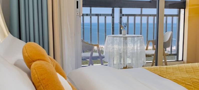 蓝海居小许公寓(闻涛路1号分店)图片