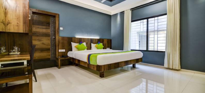 Treebo Shree Sai套房 - 距离Mahalaxmi神庙2公里(Treebo Shree Sai Suites)图片