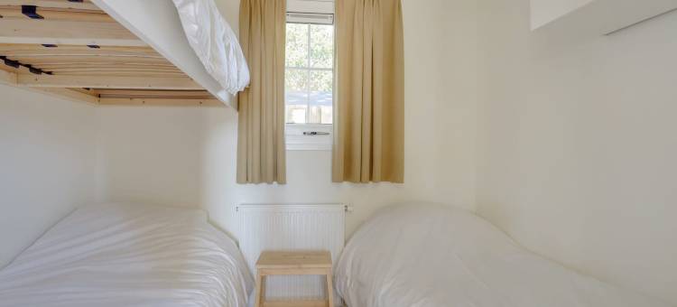 Bedafse Bergen的有露台的平房(Bungalow with a Terrace at Bedafse Bergen)图片