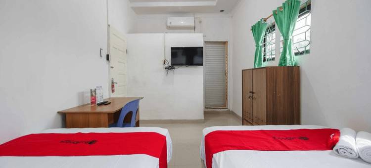红门酒店Syariah尼尔斯塔修恩克雷塔阿皮基萨兰(RedDoorz Syariah Near Stasiun Kereta Api Kisaran)图片