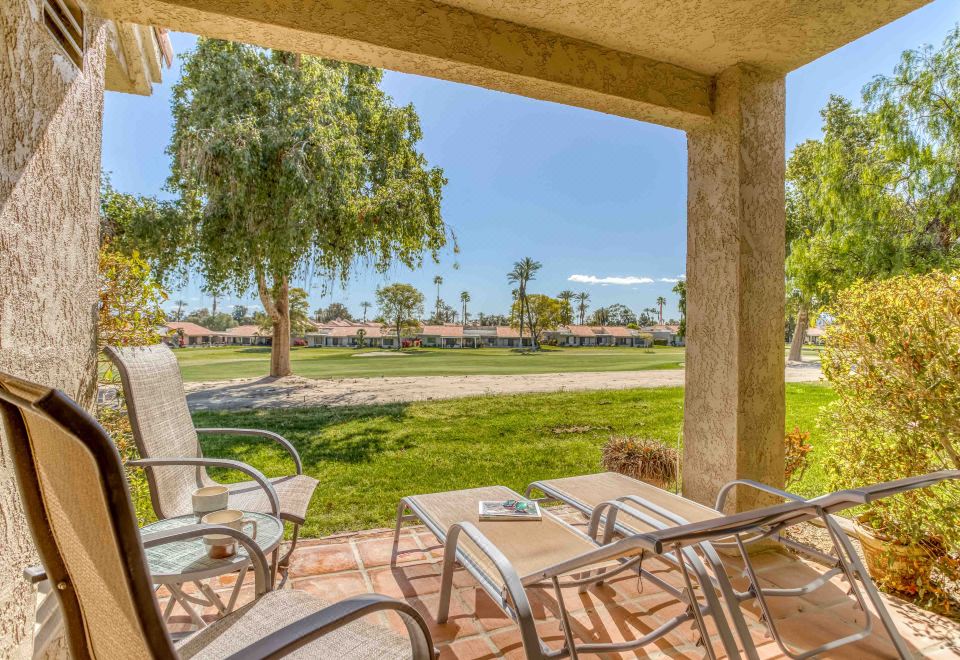 Elegant Oasis with Fireplace and Golf Course View - Charming Retreat Hotel Overview