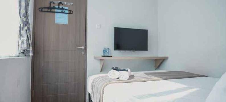 红多兹普拉斯酒店-近苏加诺哈达机场皇冠公园(RedDoorz Plus Near Soekarno Hatta Airport Taman Mahkota)图片