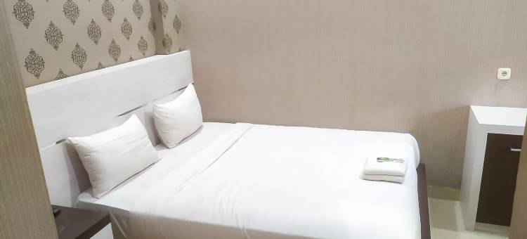 OYO1539阿姆里客房酒店(RedDoorz Syariah Near Sultan Syarif Kasim II Airport)图片