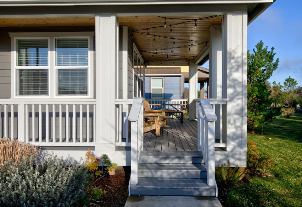 Open Concept Living and Back Porch Bliss - Charming Coastal Retreat Hotel Overview