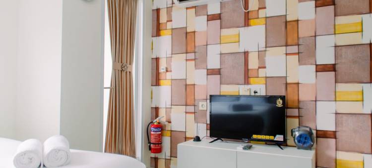 宾塔罗图标公寓舒适而温馨的工作室房间(Comfortable and Cozy Studio Room at Bintaro Icon Apartment)图片