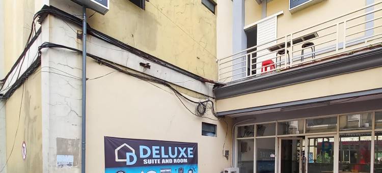 红门酒店@德卢克斯酒店-近普拉巴亚布努拉西车站(RedDoorz at Deluxe Hotel Near Terminal Purabaya Bungurasih)图片