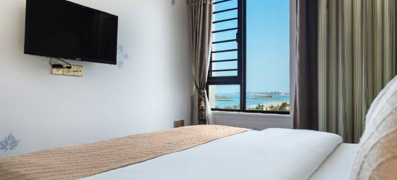 蓝色听风公寓(星海路分店)图片