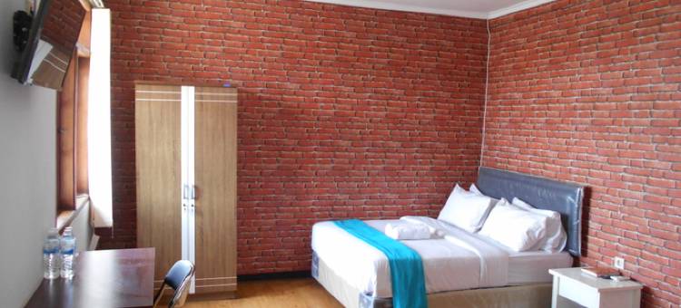 鲁玛伊斯兰及科兰雷南布根维尔旅馆(Rumah Syariah & Kolam Renang Bugenville Guesthouse)图片