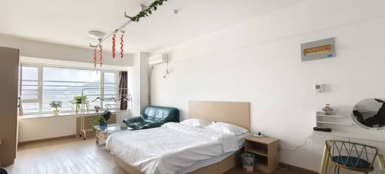 北站温馨房东宋温暖民宿(世昌大道分店)图片