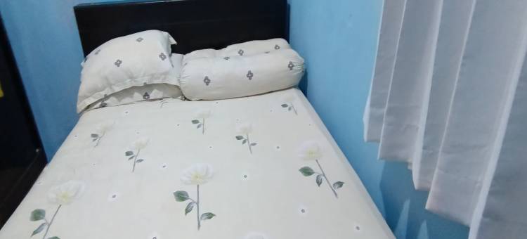 OYO 酒店阿尔阿沙尔旅馆靠近阿西尔乌拜小吃店(Hotel O Penginapan Al-AsharNearWarung Acil Ubai)图片