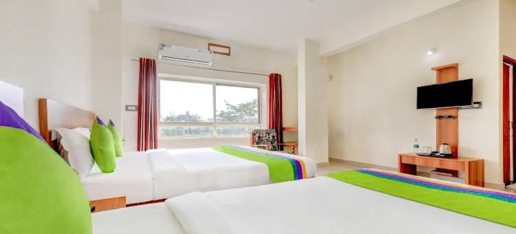 Treebo Atithi舒适酒店，距离Nisargadhama森林1公里(Treebo Atithi Comforts, 1 Km from Nisargadhama Forest)图片