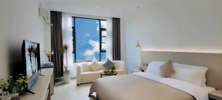 大理屋里请客栈(兴盛大桥洱海月湿地公园店)图片