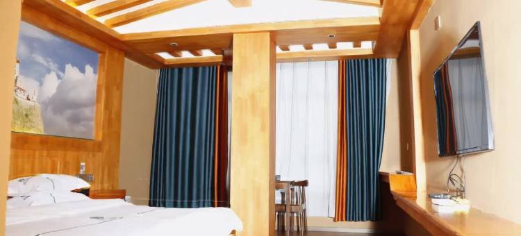 慈悲之路民俗酒店(格萨尔广场店)图片