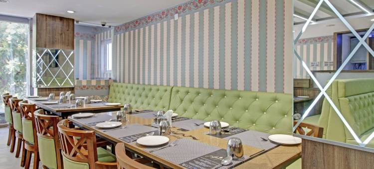 Treebo 乌莎瓦西维阿利皮里路，距离提鲁帕提中央公交车站2公里(Treebo Usha Vasavi Alipiri Road, 2 Km from Tirupati Central Bus Station)图片