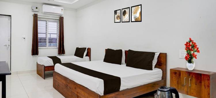 豪华迷你绕城内洛尔路(Super OYO Collection O Mini Bypass Nellore Road Formerly Amr Guest Inn)图片