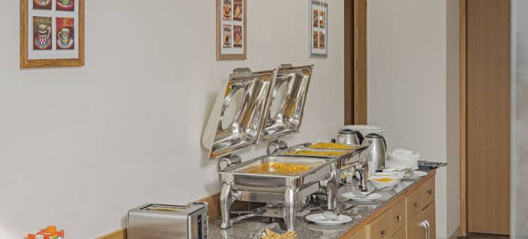 Treebo Abhi 套房，距古图尔交汇处 400 米(Treebo Abhi Suites, 400 M from Guntur Junction)图片