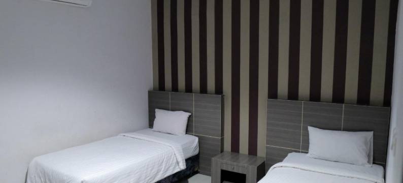 红多兹酒店@帕桑卡尤马穆朱乌塔拉(RedDoorz @ Pasangkayu Mamuju Utara)图片