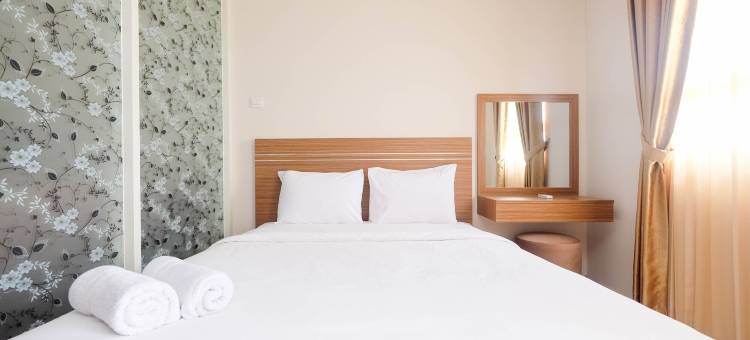 在Atlanta Residences的温暖如家的1卧室公寓，由Travelio提供(Warm and Homey 1Br Apartment at Atlanta Residences by Travelio)图片