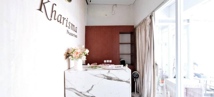 卡里斯玛努山塔拉萨甘米特拉红门酒店(Kharisma Nusantara Homestay Sagan Mitra RedDoorz)图片